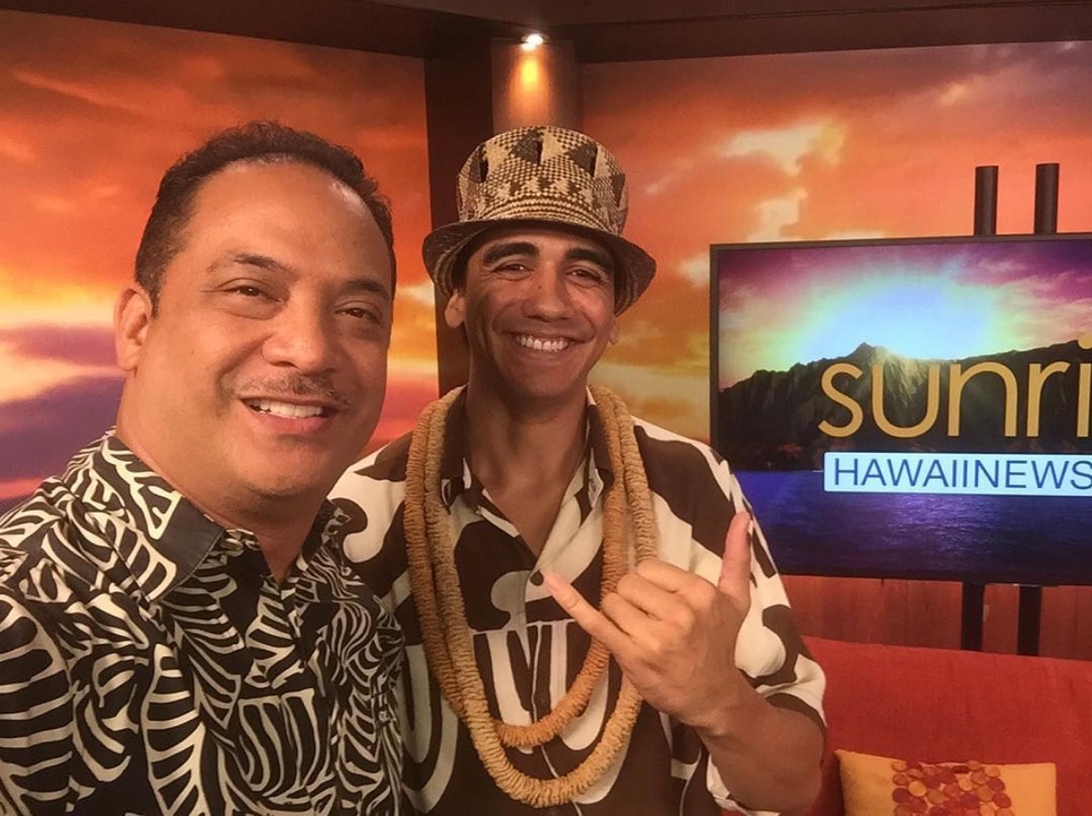 Two men Hawaiian shirts TV studio set