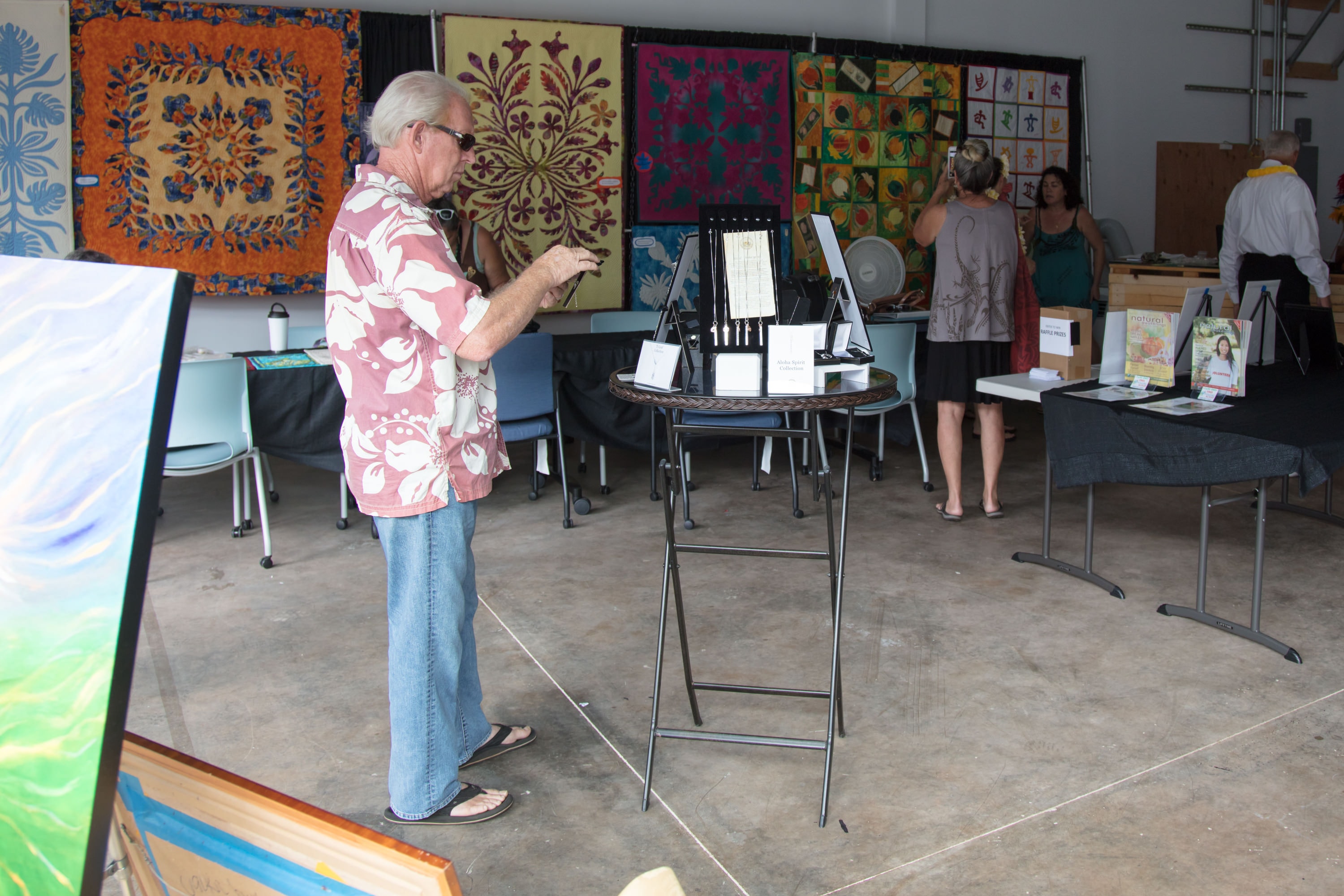 Man presenting at art exhibition gallery