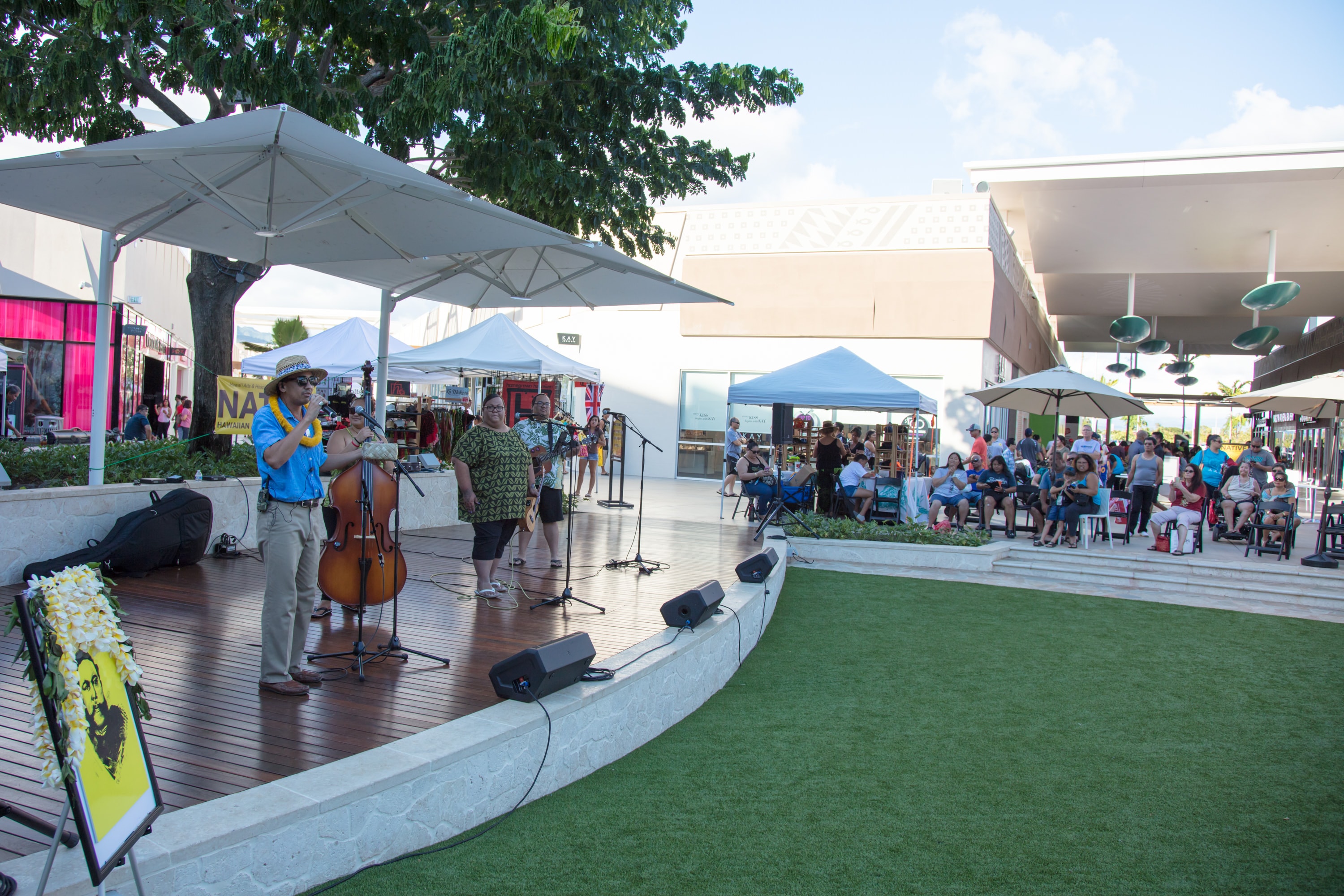 Cellist performing outdoor community market event