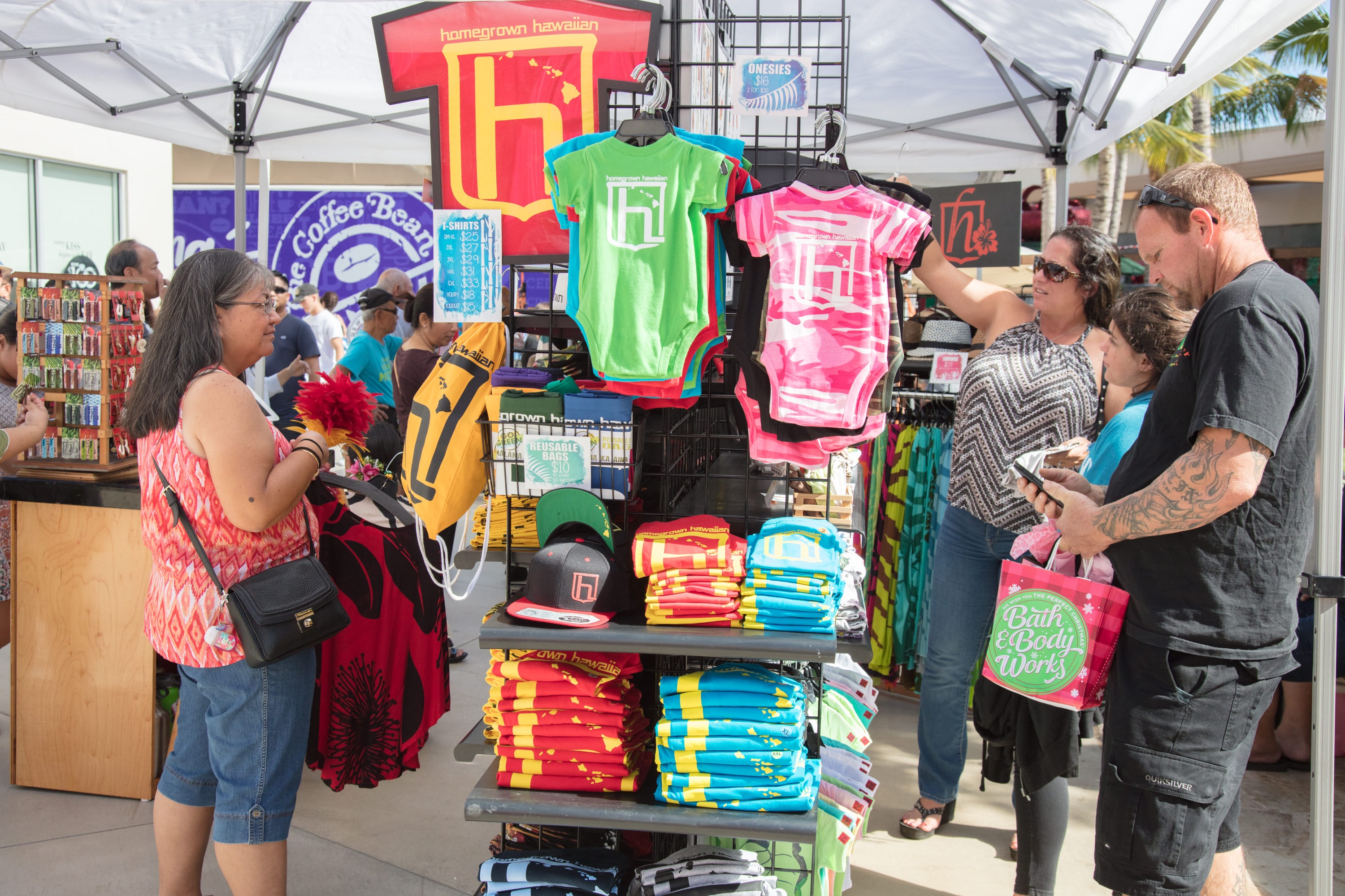 Shoppers browsing Homegrown Hawaiian merchandise