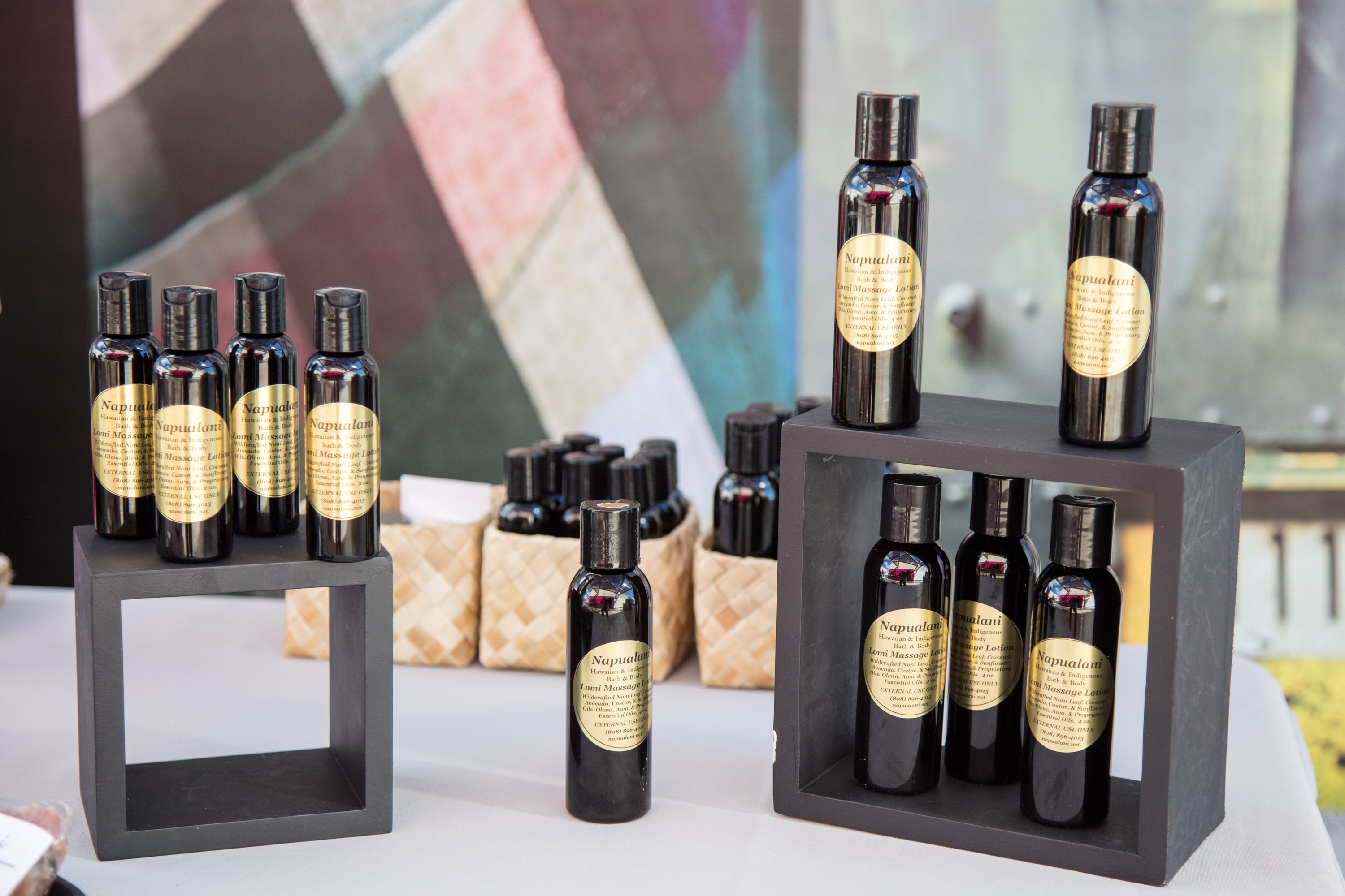 Napualani massage oil bottles display