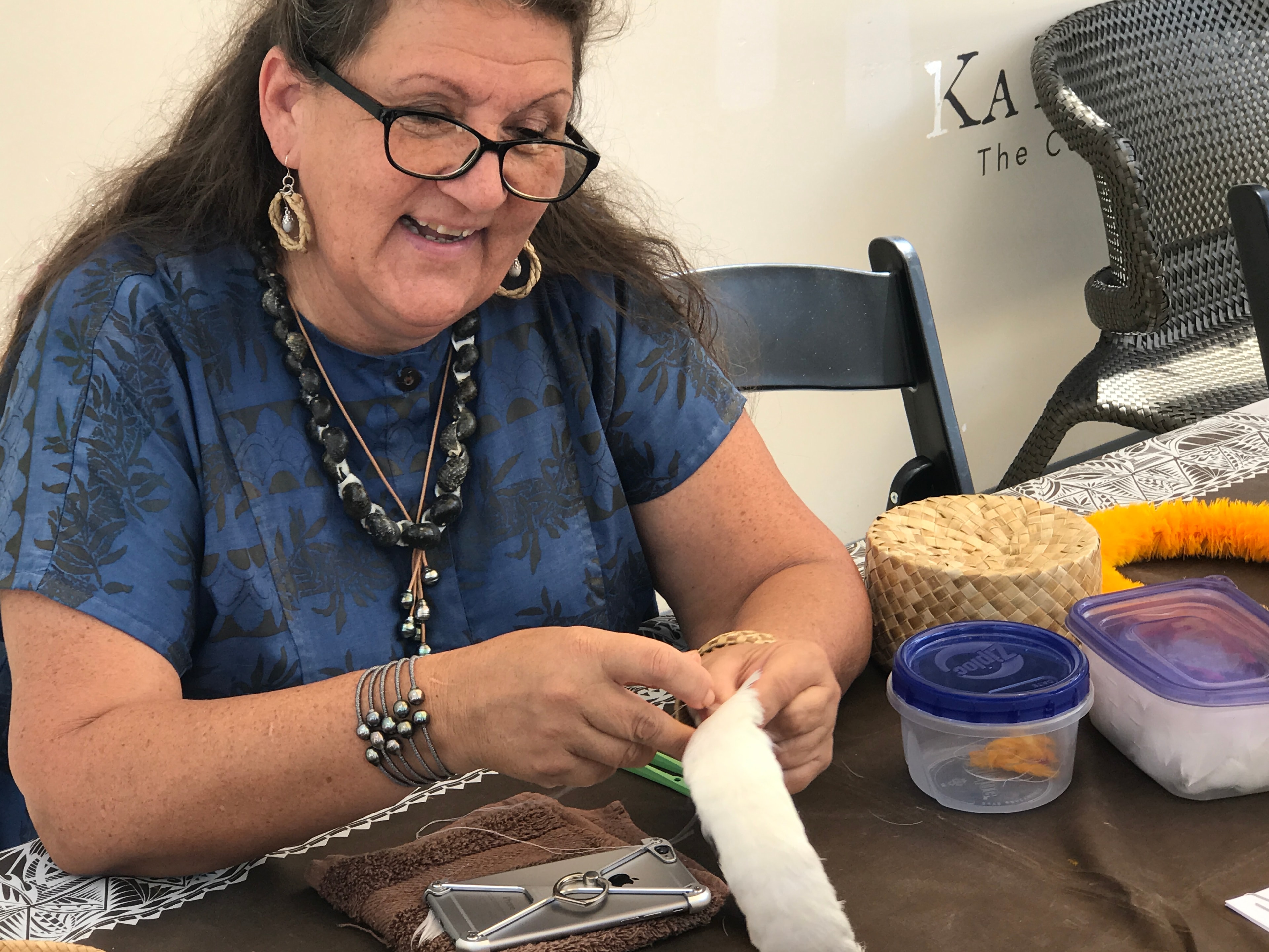 Woman crafting with natural materials supplies