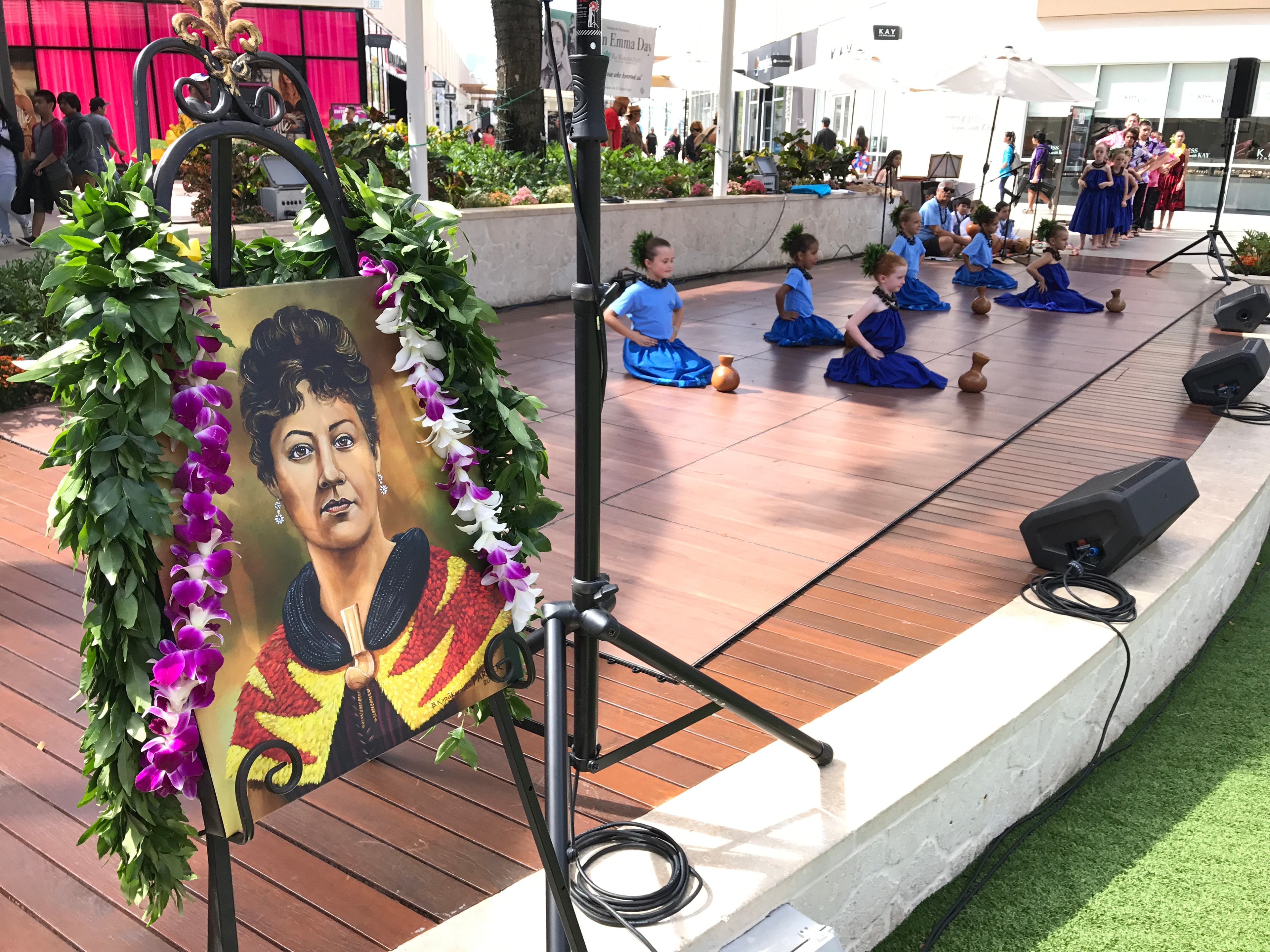 Children performing hula dance outdoor event
